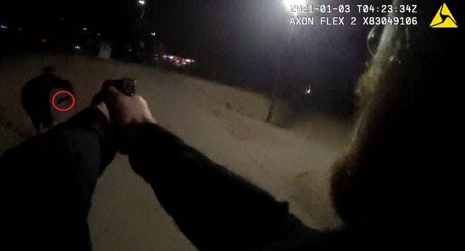 A photograph from a Chandler police officer body-worn camera that officials say shows 17-year-old Anthony Bernal Cano display a gun on Jan. 2, 2020.