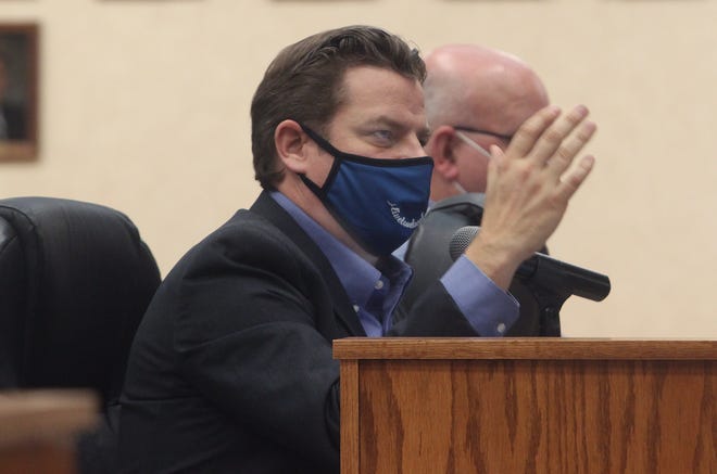 Moberly City Manager Brian Crane gestures as he gives a report about plans to renovate City Hall's council chamber area to the city council during a Monday, Jan. 4 business meeting.