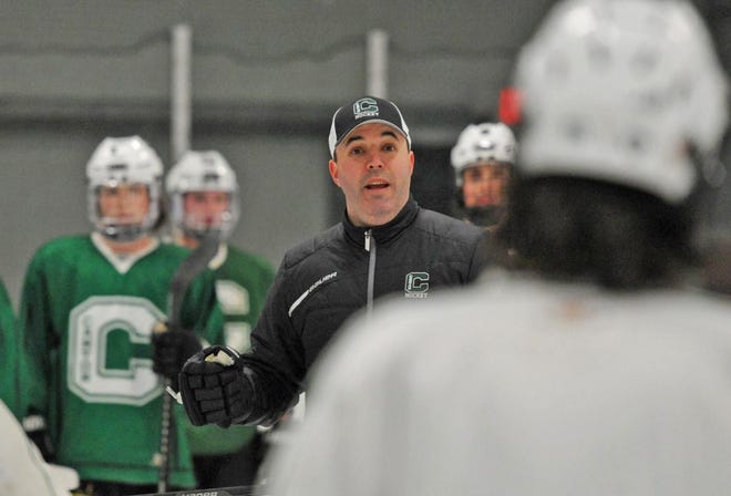 Canton boys hockey coach Brian Shuman instructs his team durng practice on Tuesday, March 10, 2020.
