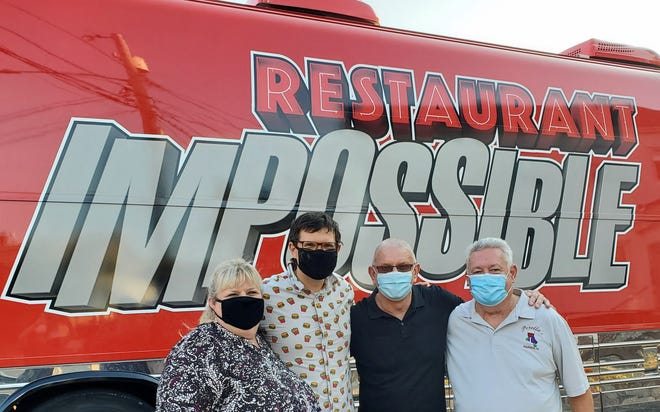 Robert Irvine and his "Restaurant Impossible" team from Food Network arrived in Warren in August to film an update from Perella's Ristorante. Pictured are Doreen Perella, son Lou E. Perella, Irvine and owner/chef Louie Perella.