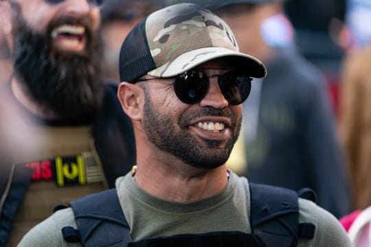 Enrique Tarrio, leader of the Proud Boys, a far-right group, is seen at a "Stop the Steal" rally against the results of the U.S. Presidential election outside the Georgia State Capitol on Nov. 18, 2020, in Atlanta.
