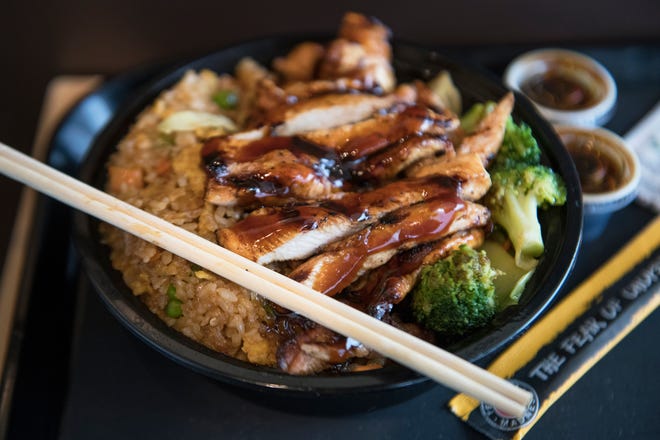 Teriyaki chicken breast with fried rice is displayed in Teriyaki Madness in Marlton.