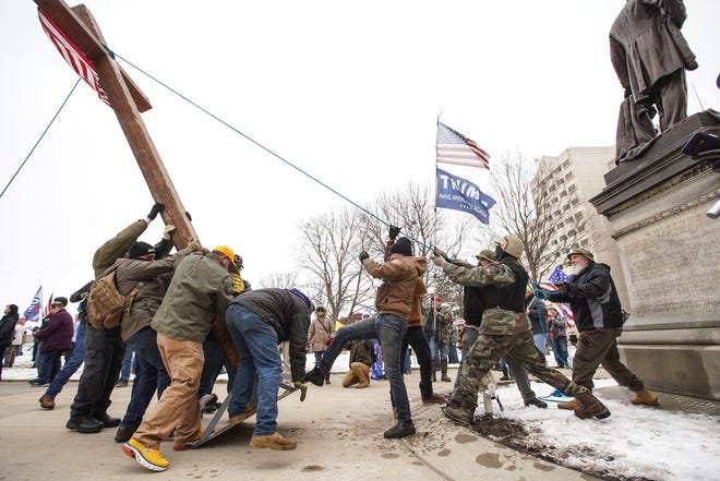 Fact check: Demonstrators erected a cross at Michigan Capitol