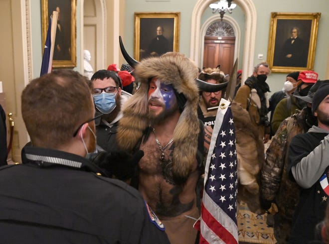 Arizona Qanon Supporter Jake Angeli Joins Storming Of U S Capitol