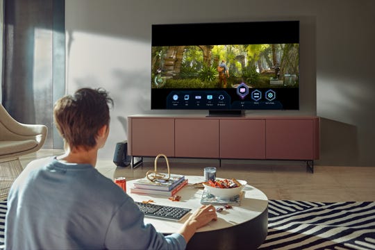 New Samsung TVs will have the Super Ultrawide Gameview feature, which lets you play in 21:9 and 32:9 aspect ratios. And a Game Bar feature lets you quickly change aspect ratios, connect a headset or check input lag.