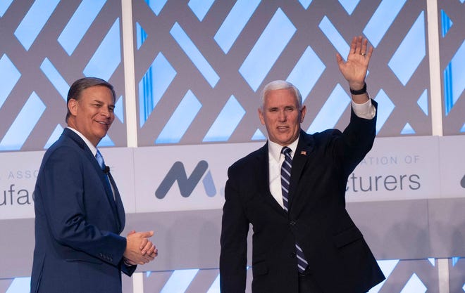 National Association of Manufacturers CEO Jay Timmons appears with Vice President Mike Pence at The Phoenician, in Scottsdale, Arizona, in March 2019.
