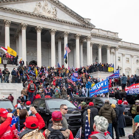 Rioters swarm the U.S. Capitol building following 