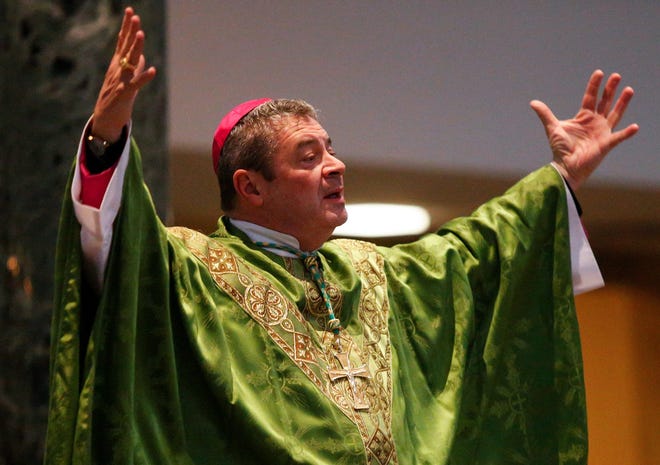 Bishop Robert Brennan speaks during a Mass of Inclusion sponsored by SPICE (Special People in Catholic Education) at St. Catharine of Sienna in Columbus in 2019.