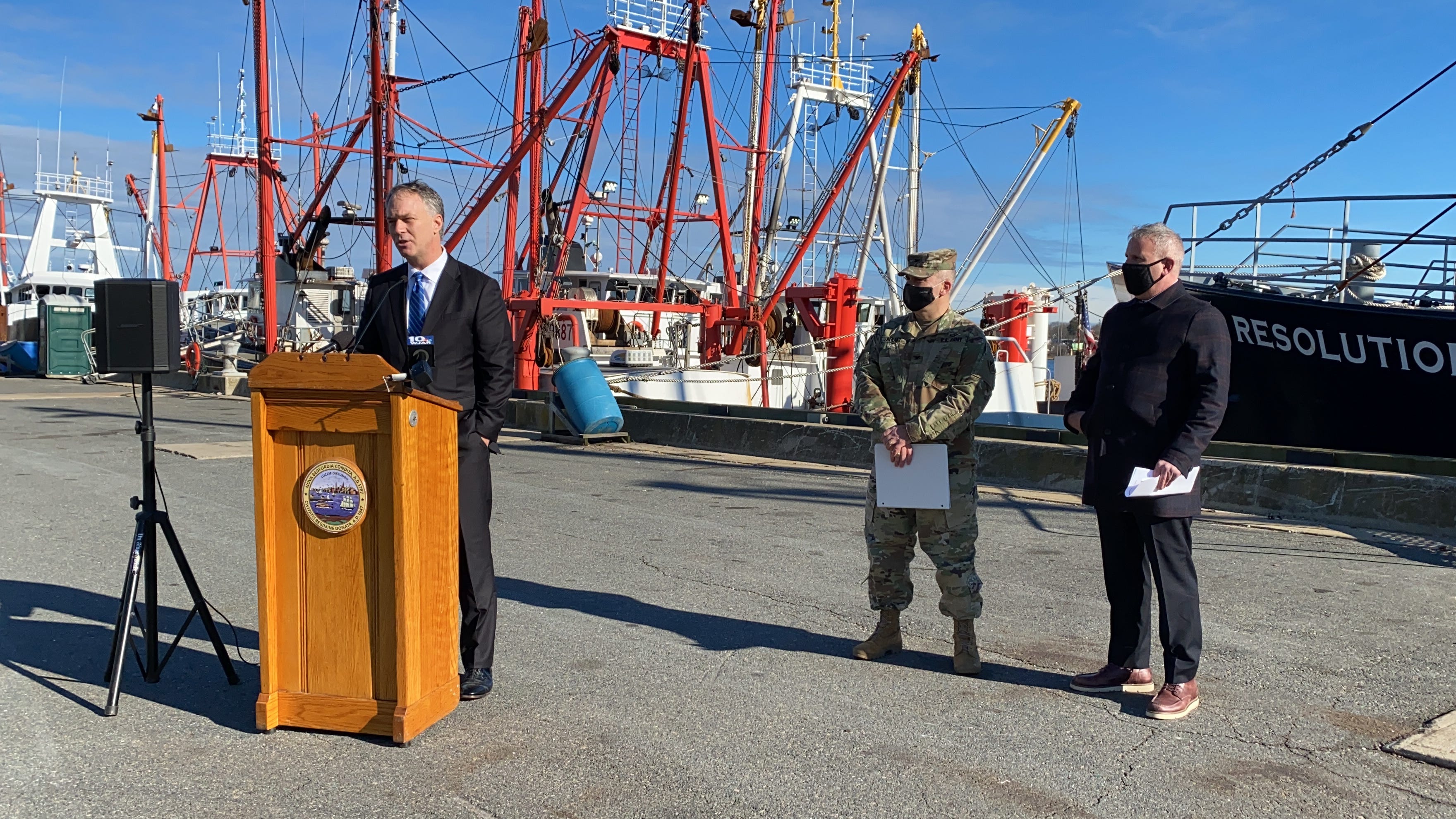 Mayor Jon Mitchell announces the transfer of the EPA Hervey Tichon dewatering facility to the New Bedford Port Authority on Jan. 7, 2021 at the site. Col. John A. Atilano II, center, and EPA New England Regional Administrator Dennis Deziel, right.
