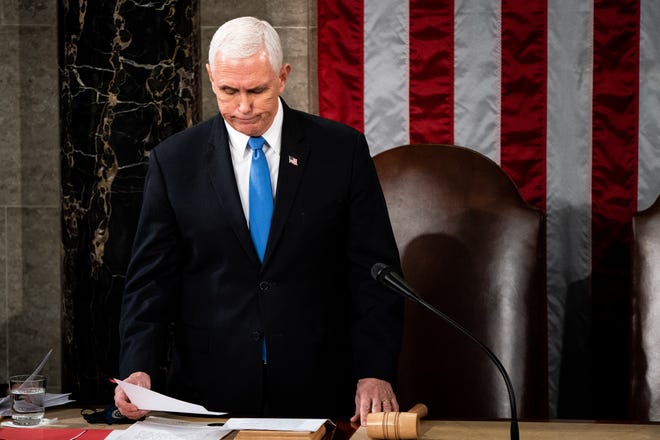 Vice President Mike Pence presides over a joint session of Congress to certify the 2020 Electoral College results on January 6, 2021.