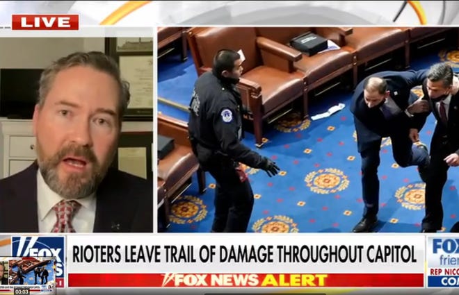 U.S. Rep. Michael Waltz speaks on Fox News after rioters broke into the U.S. Capitol