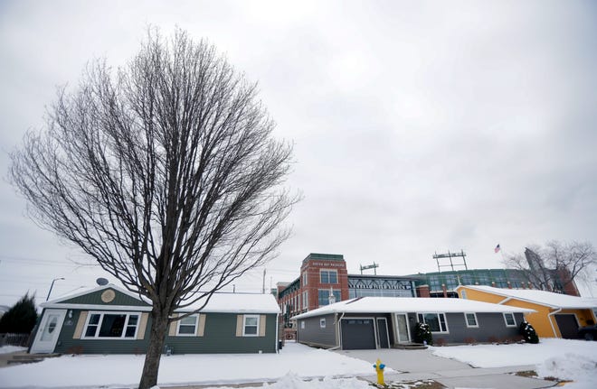 Lambeau Field Atrium seen from airbnbs and homes rented out to Packer fans who want to get the full game day experience on Thursday, Jan. 7, 2021, on Shadow Lane in Ashwaubenon, Wis.