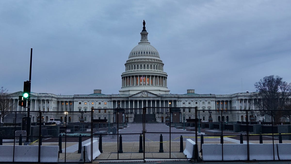 New black metal fence surrounds most of the U.S. Capitol building in Washington, D.C., two days after pro-Trump supporters stormed the Capitol. Friday, Jan. 8, 2021