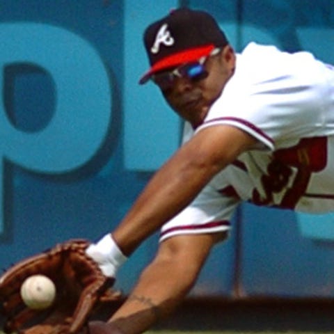 Braves center fielder Andruw Jones makes another o