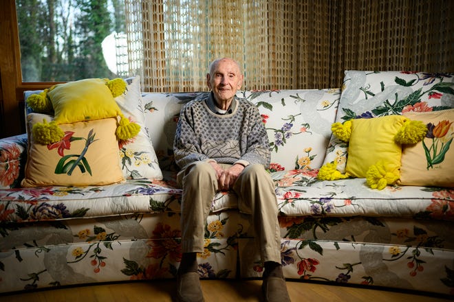U.S. Air Force veteran who served in World War II Stan Sedran poses for a portrait in his home Tuesday, Jan. 5, 2021. Sedran recently celebrated his 100th birthday.