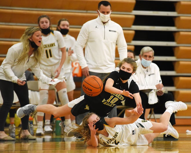 Quaker Valley's Nora Johns (10) and Blackhawk's Kassie Potts (2) battle for a loose ball during Monday night's game at Blackhawk High School.