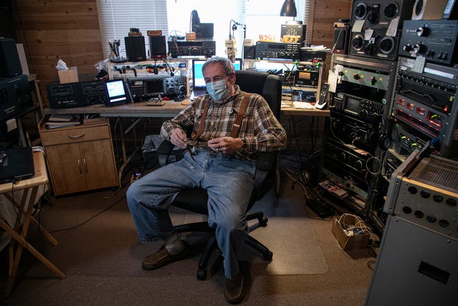 Jeff Stricker of Calumet sits in his amateur radio man cave Sunday Oct. 25, 2020.