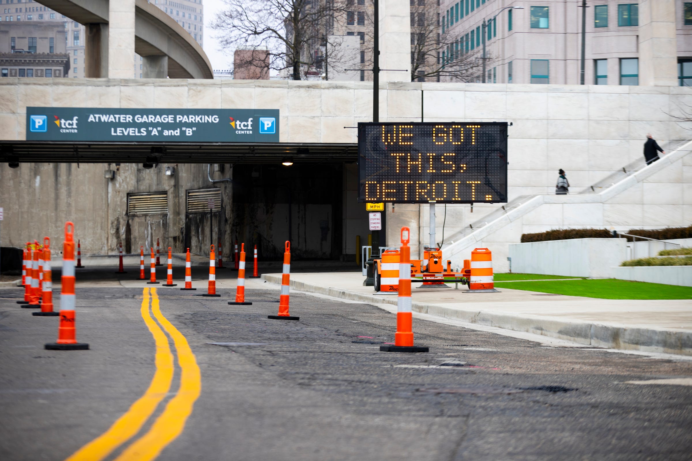 A traffic sign outside the TCF Center parking garage reads "We Got This, Detroit.", on  January 12, 2021, in Detroit. The center will be used as a mass vaccination site.