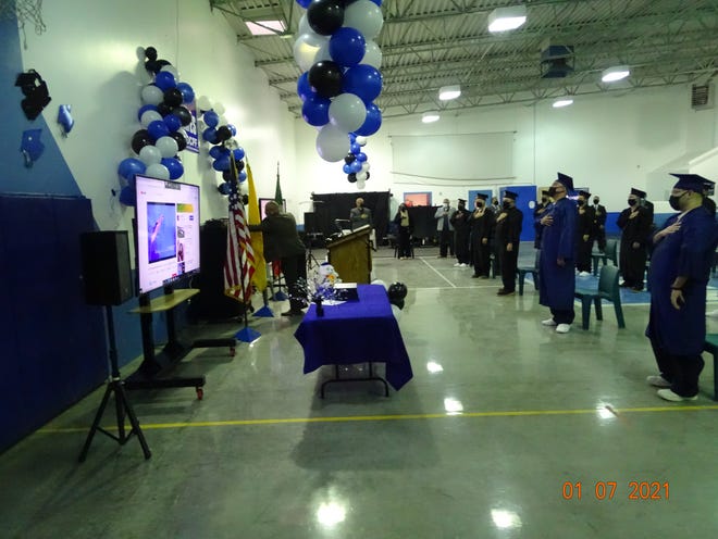 Inmates at the Otero County Prison Facility participate in a virtual commencement ceremony on Jan. 7, 2021.