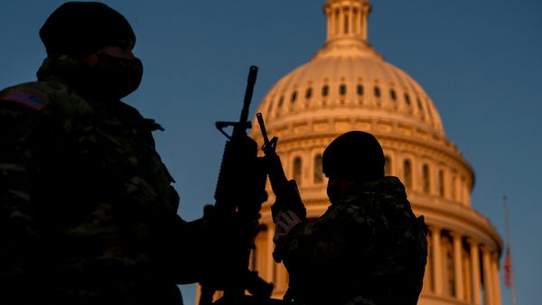 Weapons are distributed to members of the National