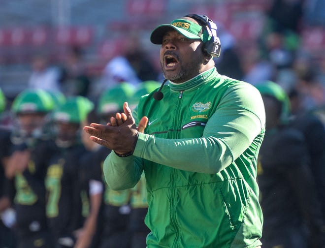 Lake Minneola head coach Walter Banks calls out to his players at the Class 6A state championship game on Dec. 18 against Miami Central at Doak Campbell Stadium in Tallahassee. [PAUL RYAN / CORRESPONDENT]