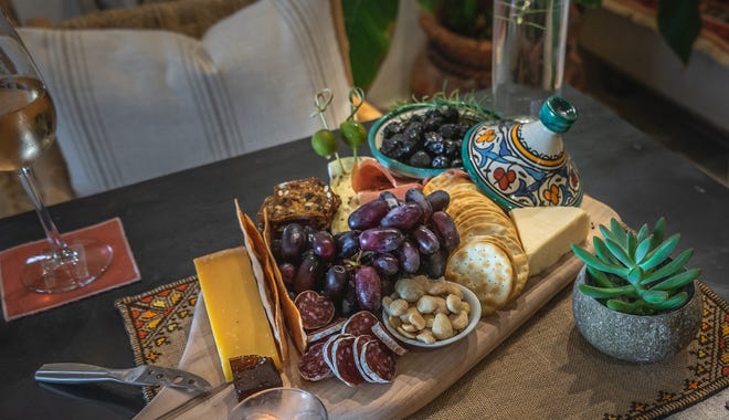 At Nomad by Sean Rush, a charcuterie and cheese board. [Sean Rush]