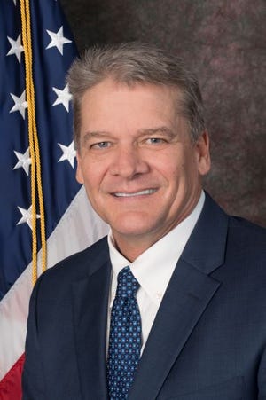 Public Defender Blaise Trettis, a member of the Charter Review Commission, has been the center of controversy since introducing his proposal to recall school board members because of the mask mandate passed in the fall.