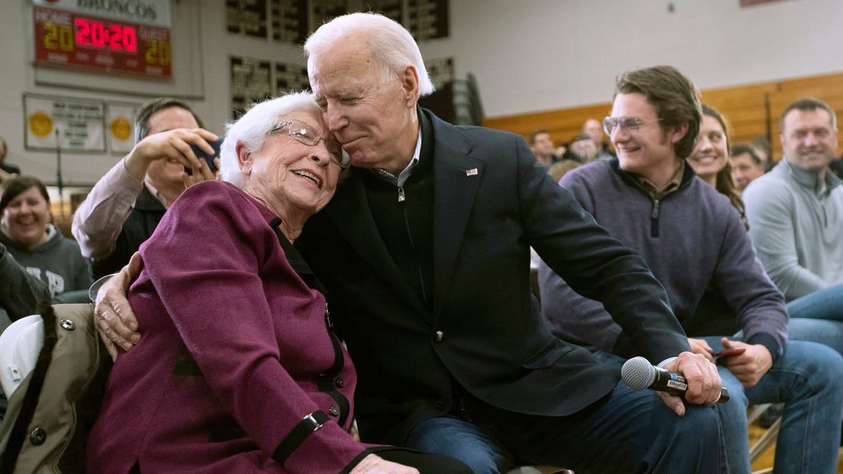 President-elect Joe Biden, then a presidential candidate, hugs a supporter during a campaign rally Feb. 9, 2020, in Hudson, New Hampshire.