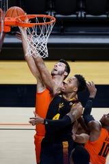 Oregon State Beavers center Roman Silva (back) and Arizona State Sun Devils forward Kimani Lawrence (4) battle for a rebound during the first half at Gill Coliseum.