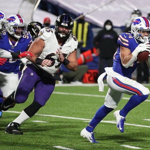 Bills cornerback Taron Johnson returns this interc