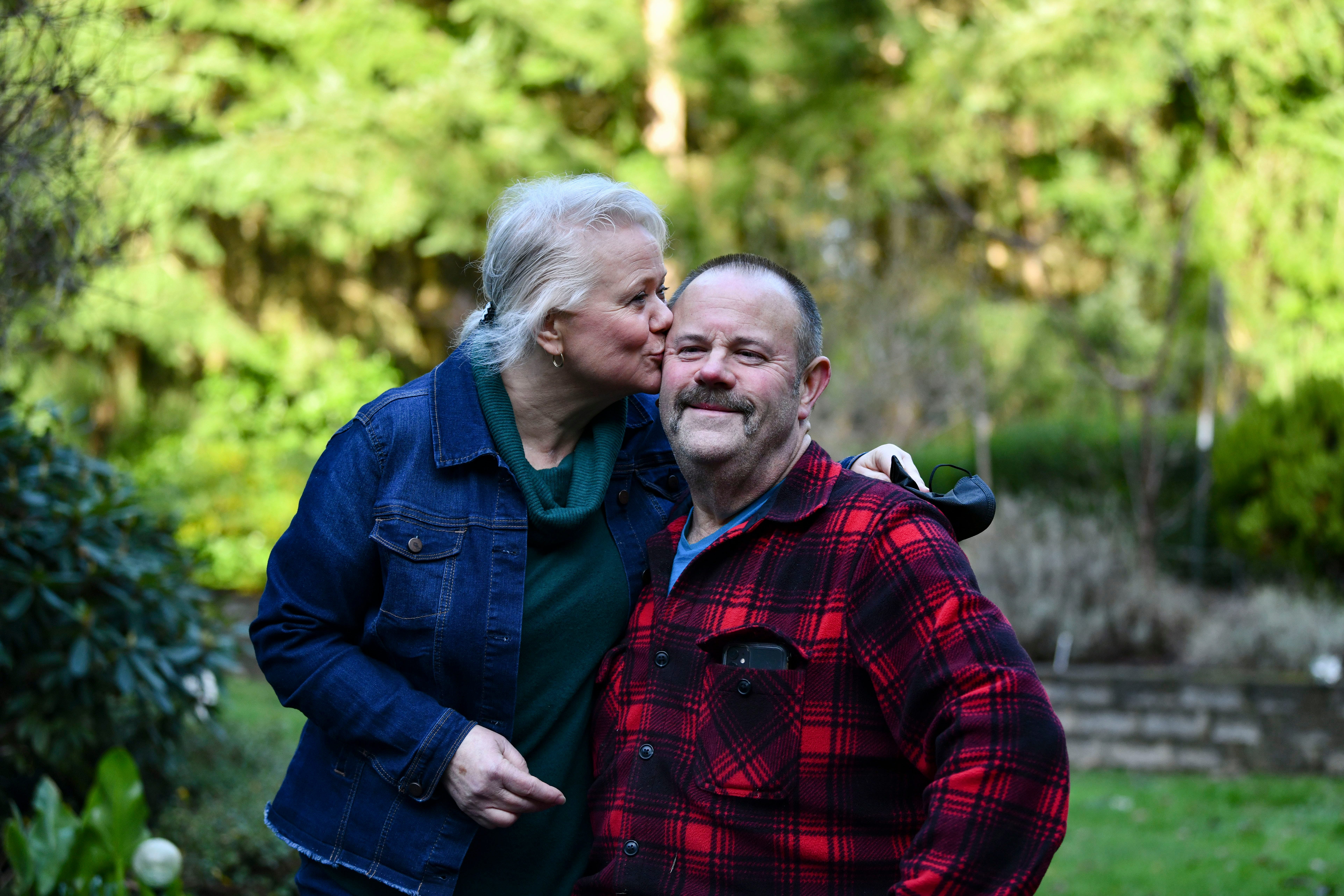 Peggy and Steve Jahn plan to renew their vows Sunday outside their church. Their son, Peter, is trying to learn how to play the theme song of the 1950s sitcom "Leave It to Beaver" on the guitar, as a tribute to when Peggy walked down the aisle 32 years ago to the same song played on a harp.