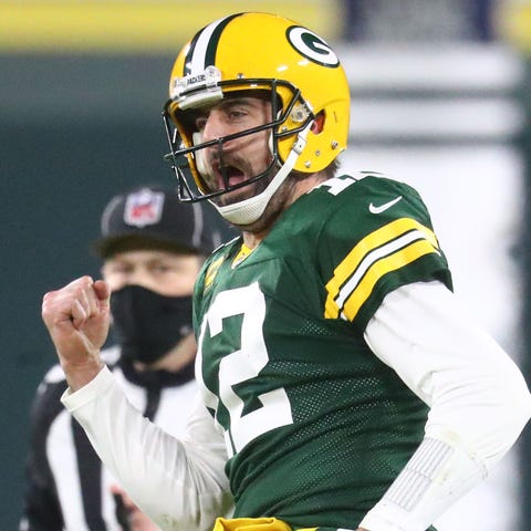 Packers quarterback Aaron Rodgers celebrates after