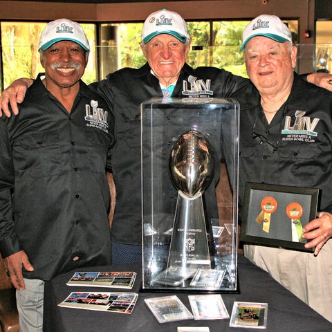 Members of the Never Miss A Super Bowl Club from l