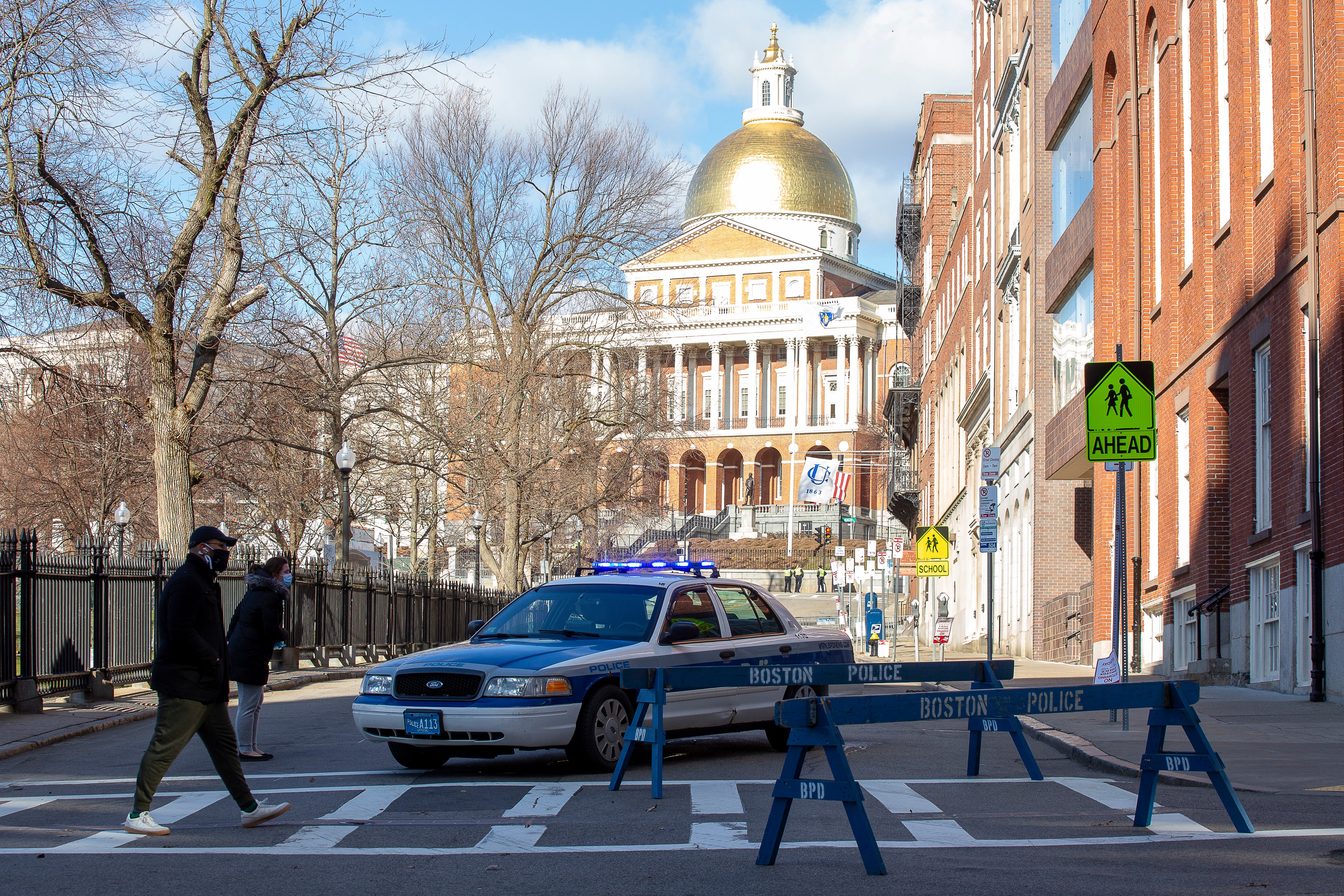 A number of streets in Boston's Beacon Hill around the Statehouse were closed down Sunday, Jan. 17, 2021, as a precaution to any protesters in the wake of the storming of the U.S. Capitol this month and ahead of the presidential inauguration.