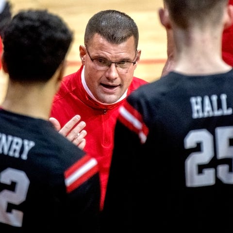 Bradley head coach Brian Wardle talks with his tea