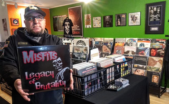 Josh Harris inside his North Canton record shop, Dr. Frankenstein's House of Wax in North Canton.