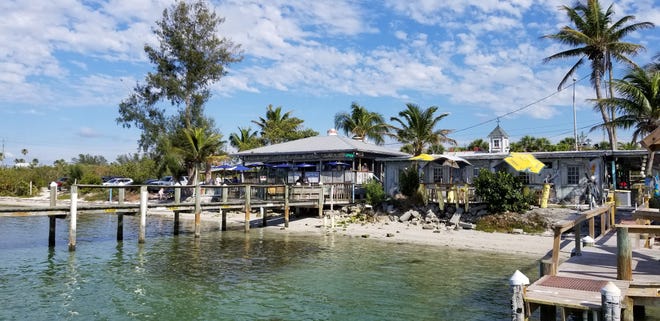New Pass Grill & Bait Shop, a local landmark dating back to 1929,  is at 1505 Ken Thompson Parkway, Sarasota.