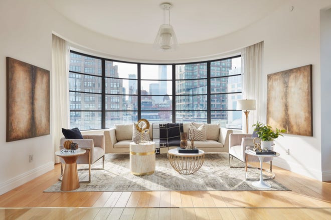 A low sofa showcases the view.