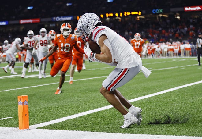 Chris Olave's decision to return to Ohio State for his senior season was welcome news in the Buckeyes' quarterbacks room, giving whoever emerges as the starter an experienced, deep-threat receiver.