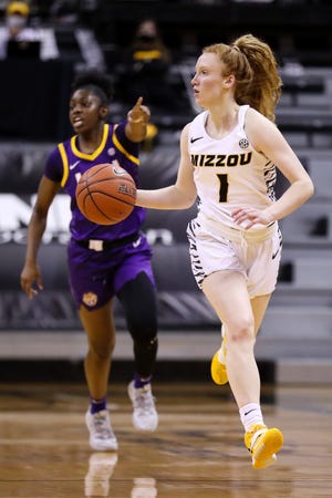Missouri guard Lauren Hansen (1) dribbles the ball during a game against LSU last season at Mizzou Arena.