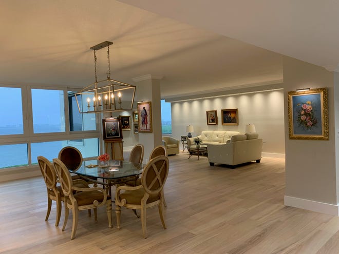 The spacious condo on Longboat Key is updated with a modern open-concept floor plan that is ideal for entertaining. It is on the market for $1.2 million