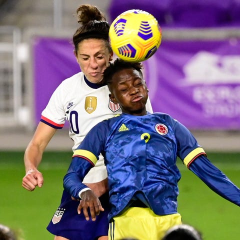Carli Lloyd and Colombia's Kelly Ibarguen fight fo