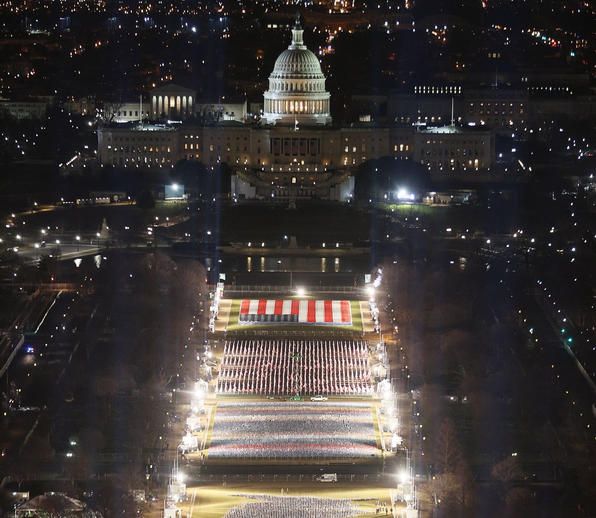 The "Field of Flags" is illuminated on the National Mall on Jan. 18, 2021 in Washington, DC.