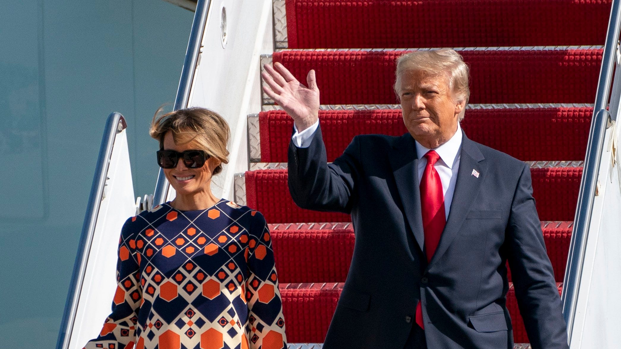 What Melania Trump wore: Black suit in DC, Gucci caftan in Florida