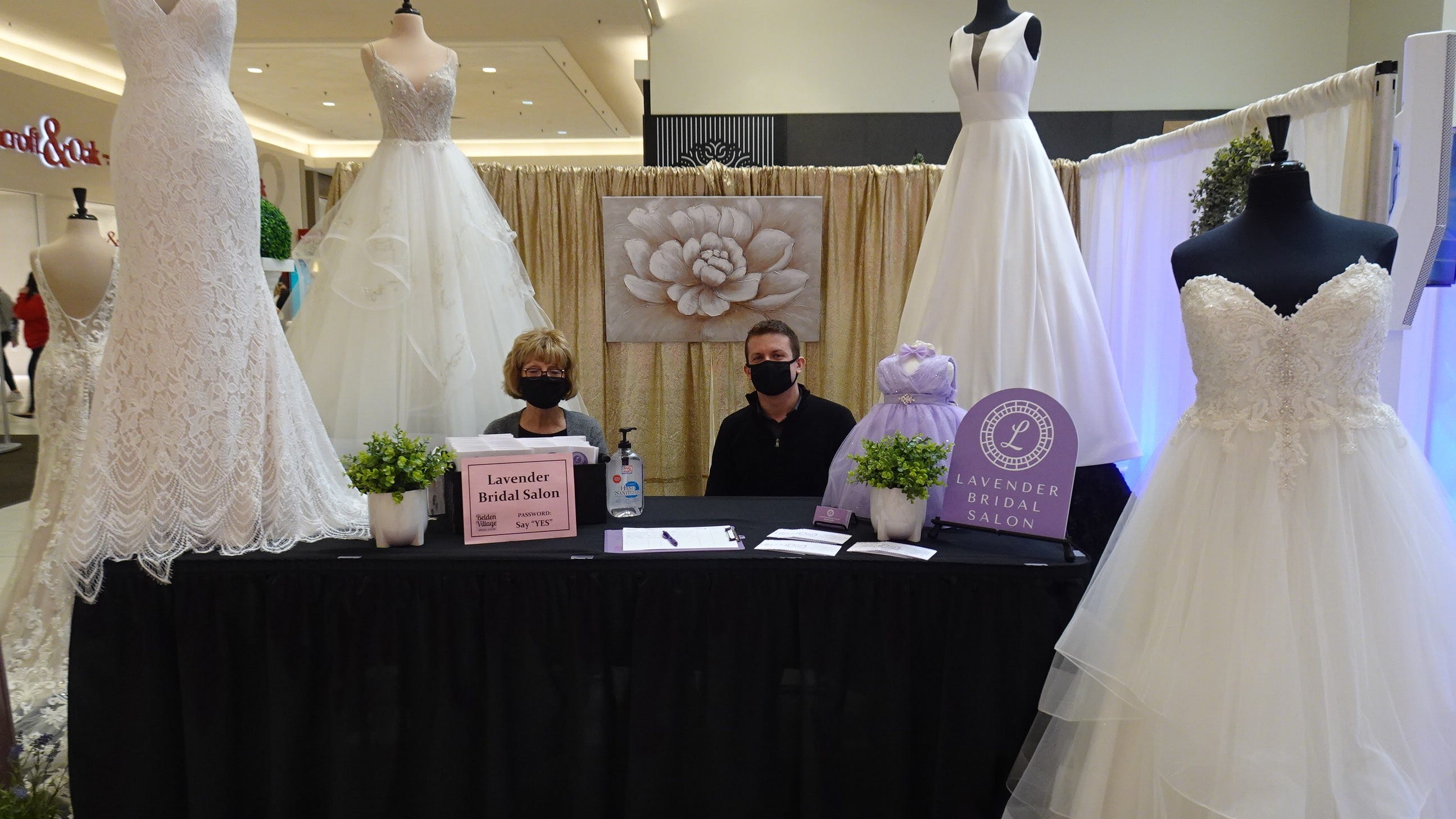 Peggy Miller and Brandon Dailey from Lavender Bridal Salon were set up at the 24th annual Belden Village Bridal Show. The company also provides the gowns for the fashion shows held during the bridal show event.
