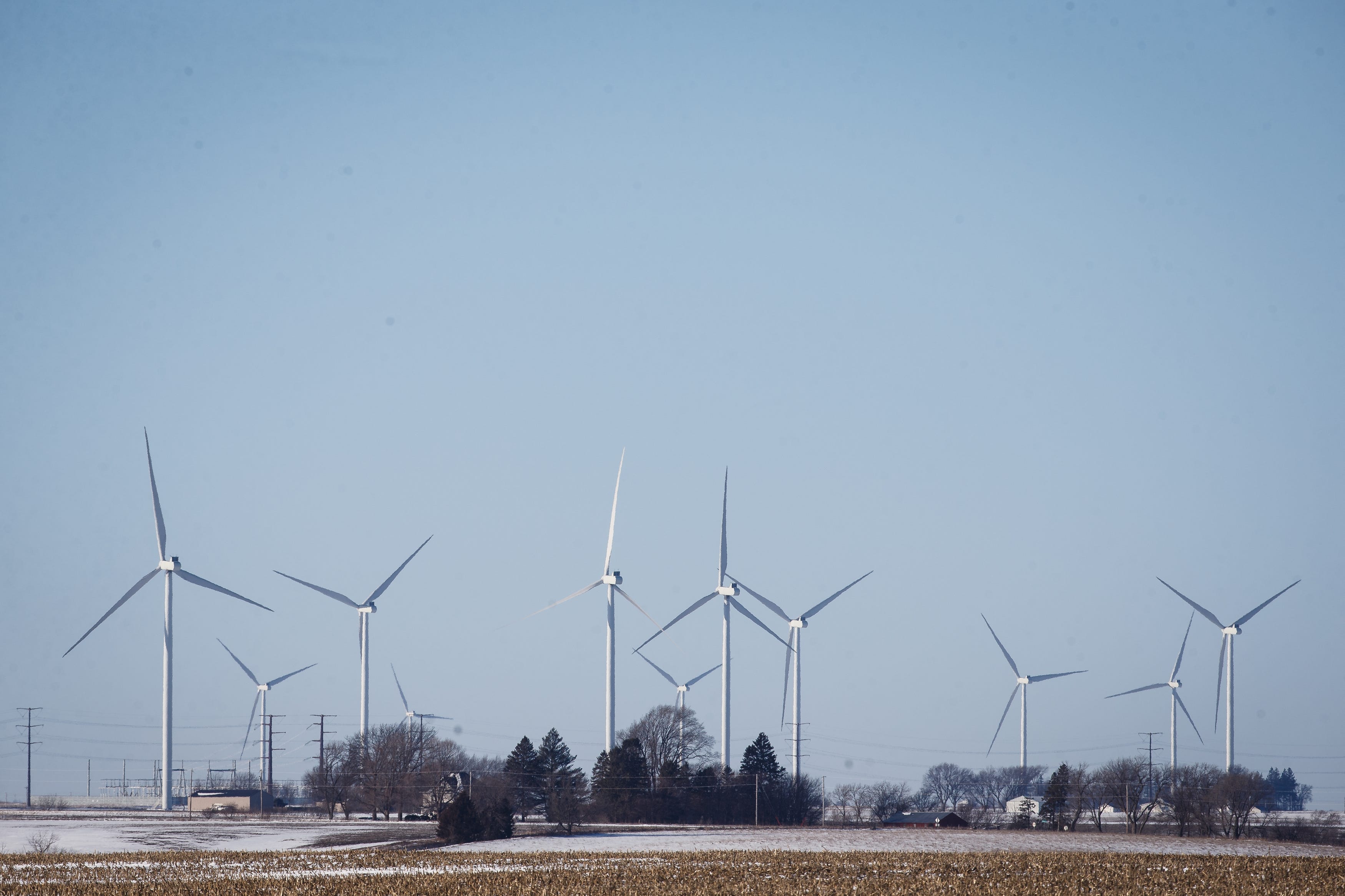 Wind turbines in Adair County, Iowa, on Jan. 20, 2021. Wind farms across the state generate the highest percentage of electrical power than any other state.