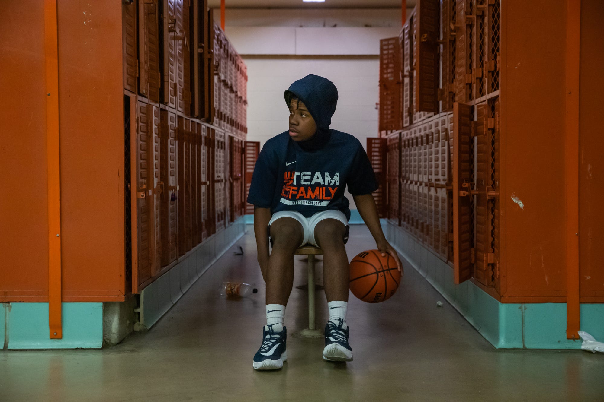 West Side Cougars' Israel Hines dribbles in the locker room before the varsity game against the East Chicago Central Cardinals at West Side Leadership Academy in Gary, Ind., on Thursday, Jan. 30, 2020.