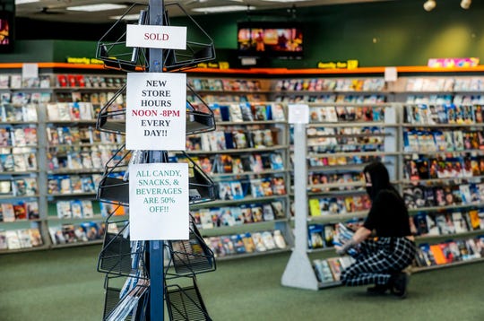 Store fixtures and movies are for sale during the store closing at Family Video, 322 S. Lebanon St., Lebanon, Ind., Wednesday, Jan. 19, 2021.