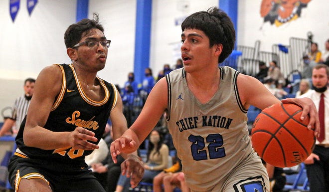 Lake View's Juan Perez, right, dribbles around a Snyder defender during a boys basketball game Tuesday, Jan. 19, 2021.