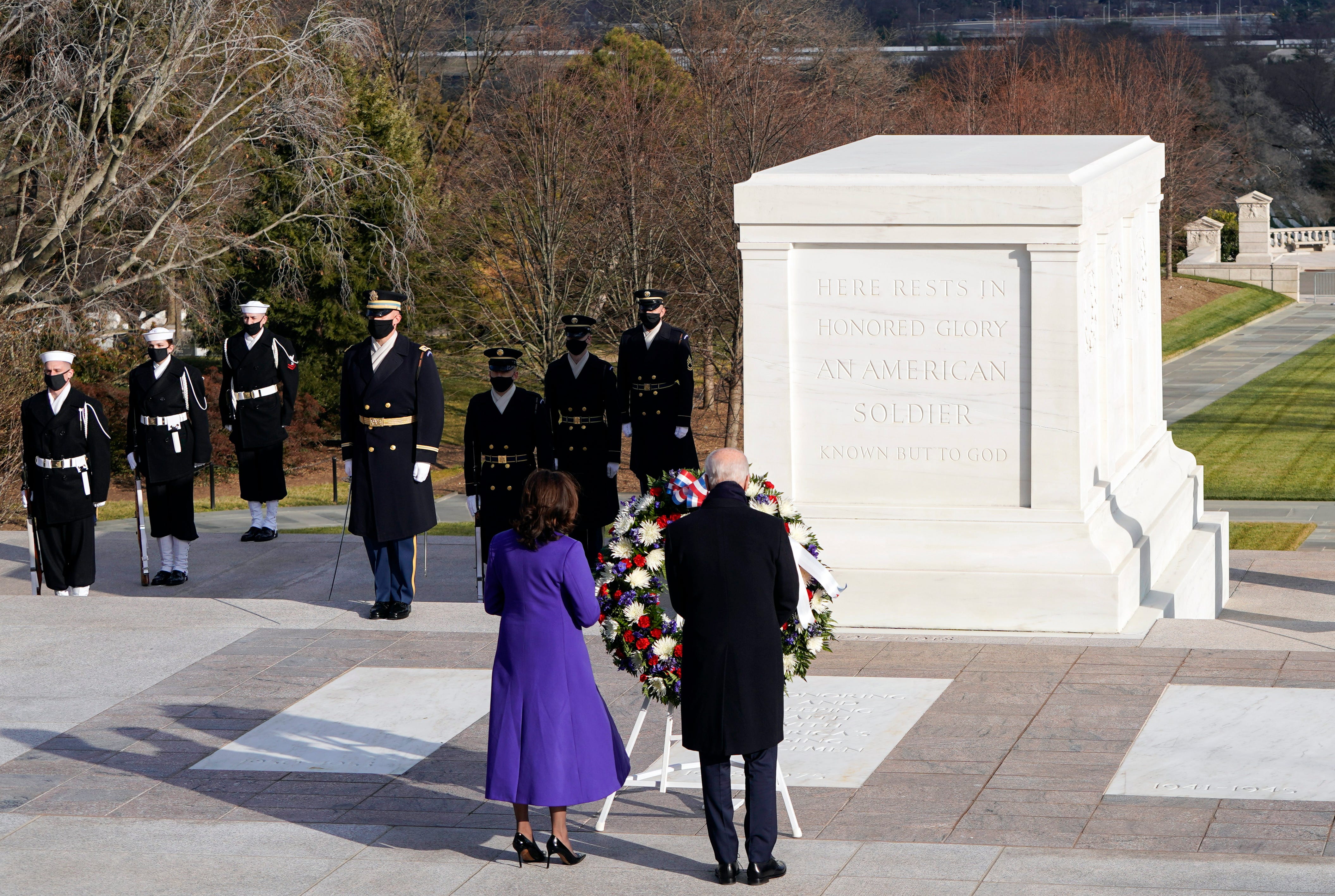 President Joe Biden and Vice President Kamala Harris lay a wreath at the Tomb of the Unknown Soldier at the Arlington National Cemetery, in Arlington, Va., Wednesday, Jan. 21, 2021.